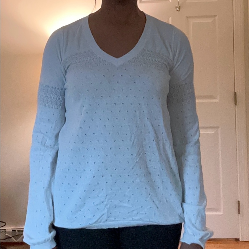 MIGUEL REVERIEGO white v-neck sweater with embroidery